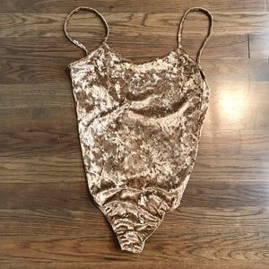 Gold bodysuit
